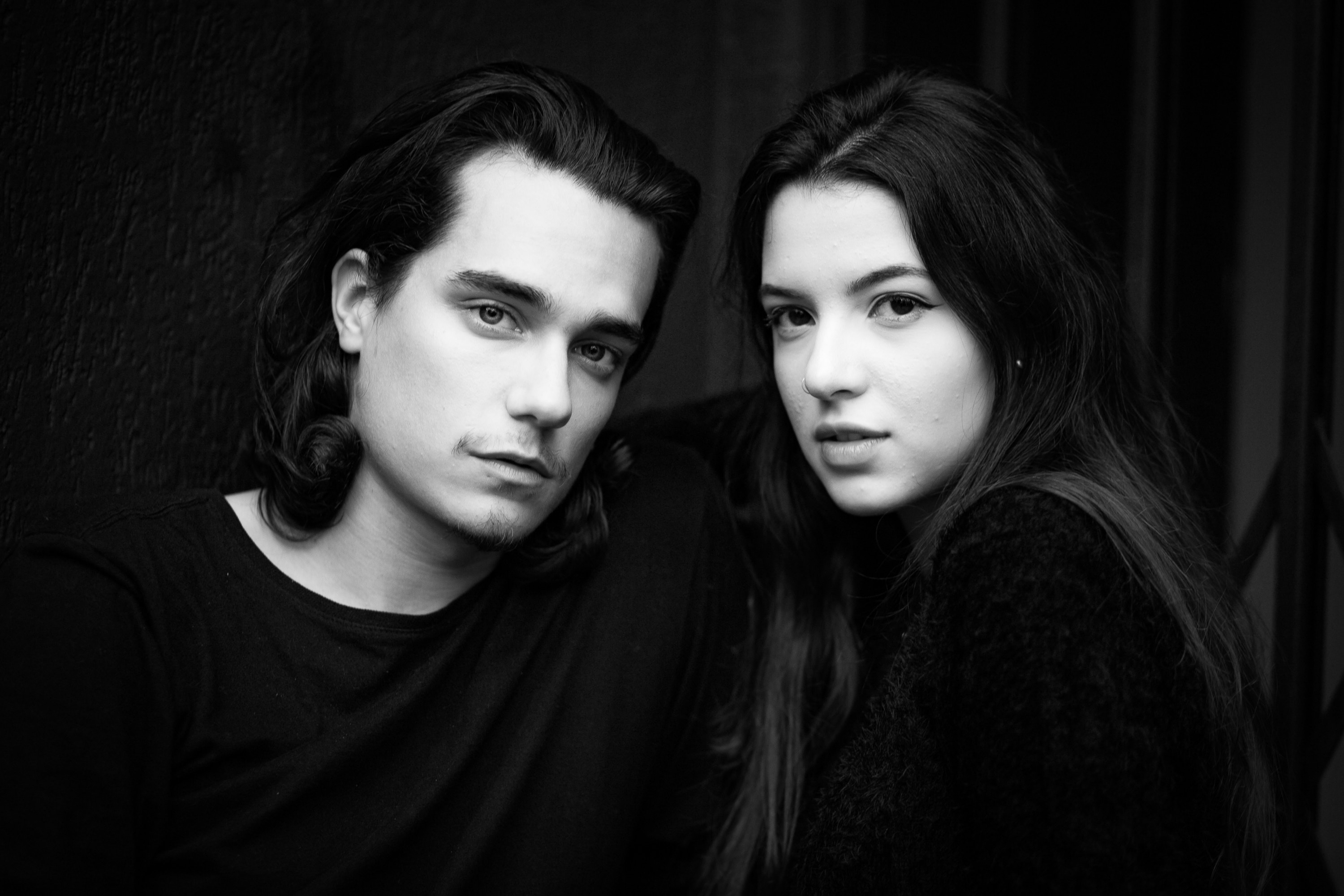 Young couple looking into the camera 